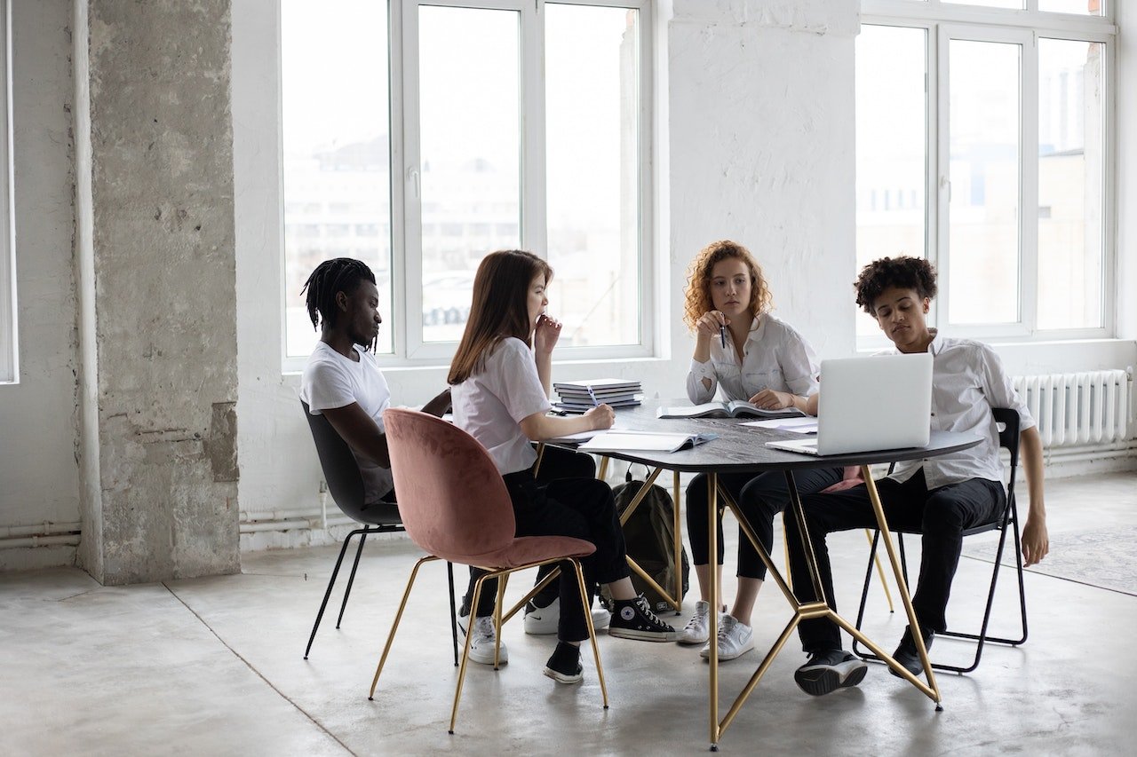 group-of-people-working-in-an-office-professional-leadership-skills