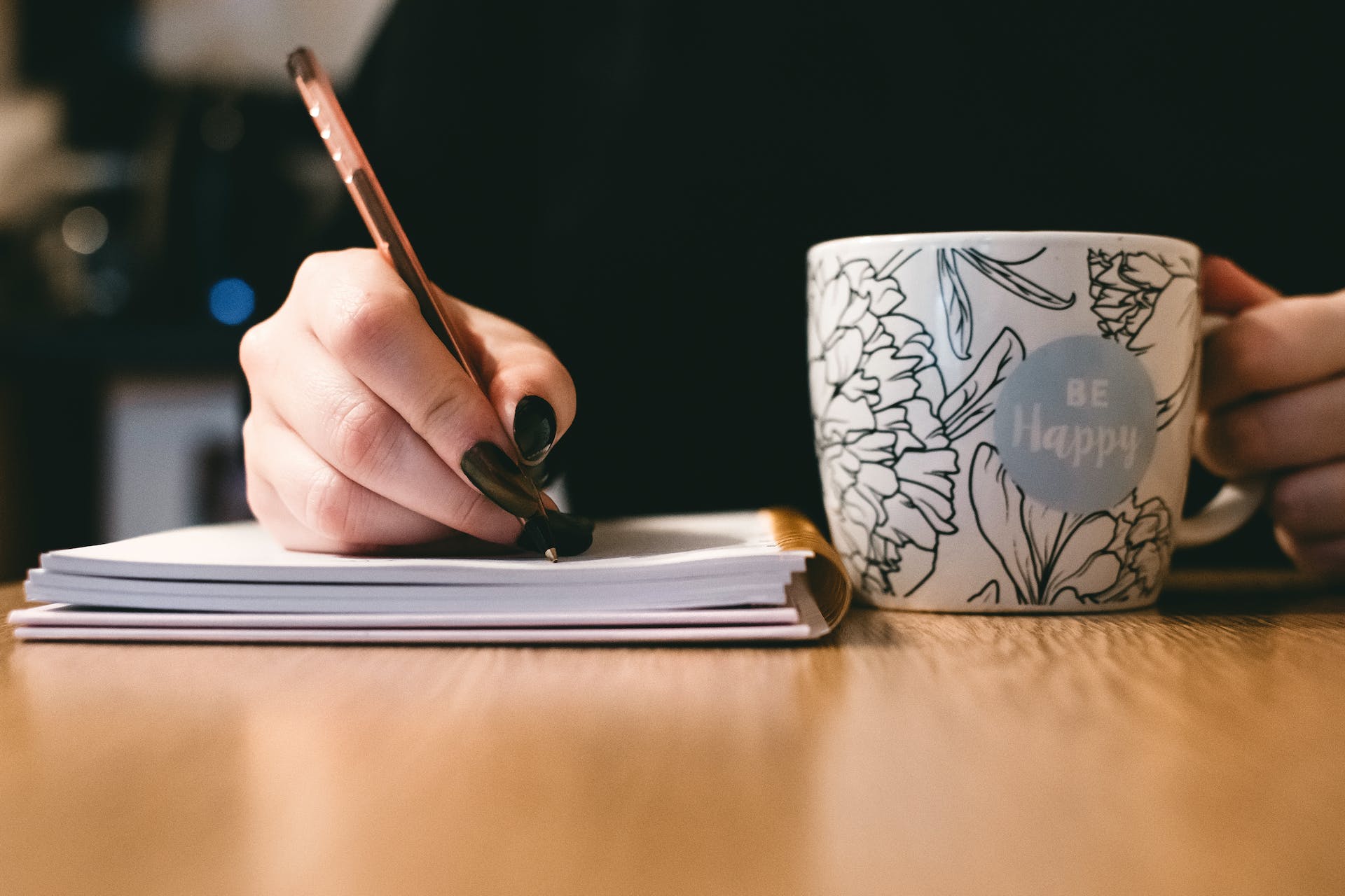 writing-while-having-a-tea-in-a-mug-written-communication-skills